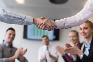 Image showing business womans handshake