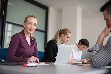 Image showing young business people group on team meeting at modern office