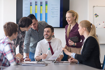 Image showing young business people group on meeting at modern office