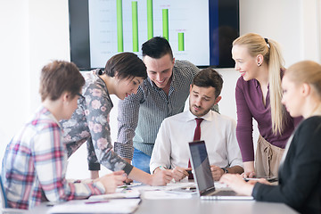 Image showing young business people group on meeting at modern office