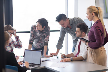 Image showing young business people group on meeting at modern office