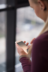 Image showing business woman using smart phone at office