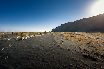 Image showing Deserted shore with black sand