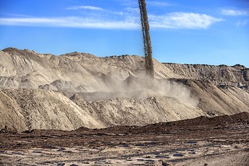 Image showing Large excavation site with heaps of sand