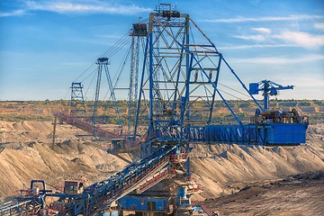 Image showing Large excavator machine in the mine