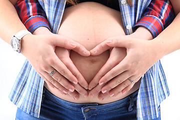 Image showing pregnancy woman and four handa\r\n