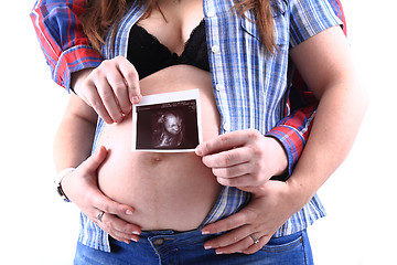 Image showing pregnancy woman with ultrasound photo 