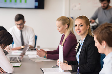 Image showing young business people group on team meeting at modern office