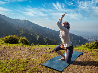 Image showing Woman doing Ashtanga Vinyasa yoga advanced asana 