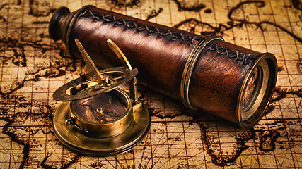 Image showing Old vintage compass on ancient map