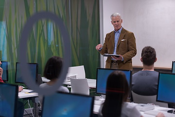 Image showing teacher and students in computer lab classroom