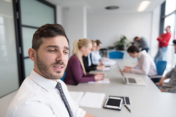 Image showing young business people group on team meeting at modern office