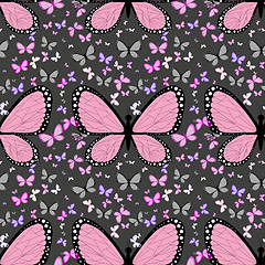 Image showing Large pink butterfly surrounded by small multicolored butterflie