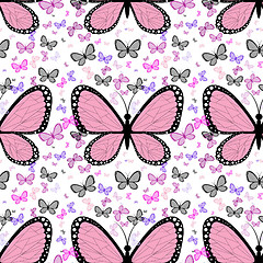 Image showing Large pink butterfly surrounded by small multicolored butterflie