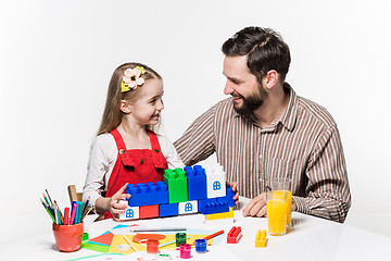 Image showing Father and daughter playing educational games together 