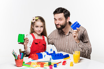 Image showing Father and daughter playing educational games together 