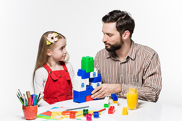 Image showing Father and daughter playing educational games together 