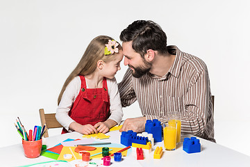 Image showing Father and daughter playing educational games together 