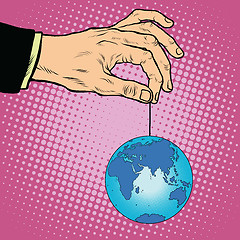 Image showing Planet earth in hand on the rope