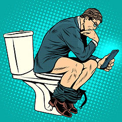 Image showing businessman thinker on toilet
