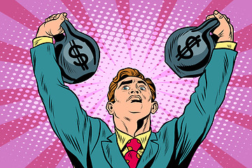 Image showing Businessman strongman lifts weights money