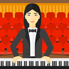 Image showing Woman playing piano.