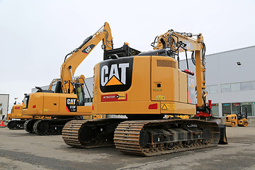 Image showing Cat Hydraulic Excavators on a Yard