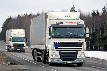 Image showing Two White DAF Cargo Trucks Platooning
