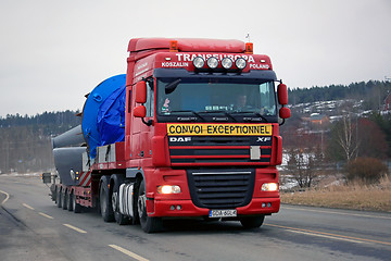 Image showing Red DAF Semi Hauls Oversize Load