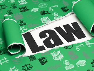 Image showing Law concept: black text Law under the piece of  torn paper