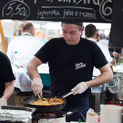 Image showing Women serving hamburgers on food festival in Ljubljana, Slovenia.