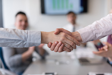 Image showing business womans handshake