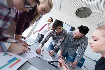 Image showing top  view of business people group brainstorming on meeting