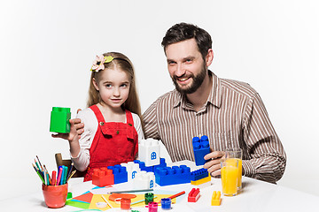 Image showing Father and daughter playing educational games together 