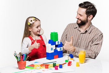 Image showing Father and daughter playing educational games together 