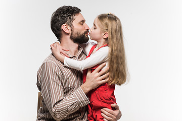 Image showing Girl hugging her father  over a white background