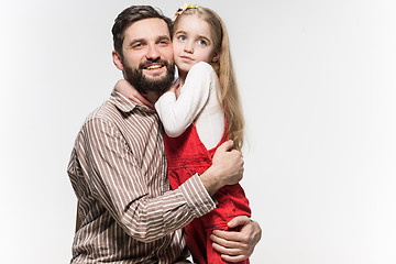 Image showing Girl hugging her father  over a white background