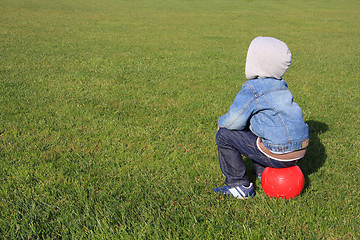 Image showing Sitting on a ball