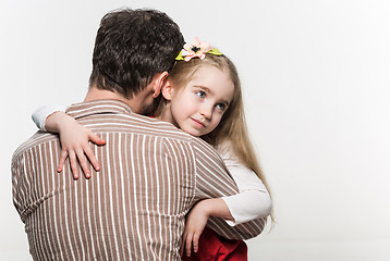 Image showing Girl hugging her father  over a white background