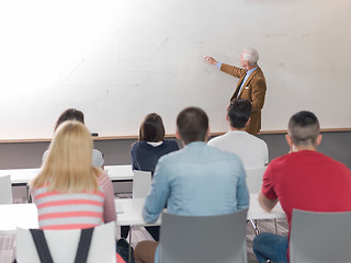 Image showing teacher with a group of students in classroom