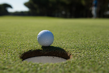 Image showing golf ball in the hole