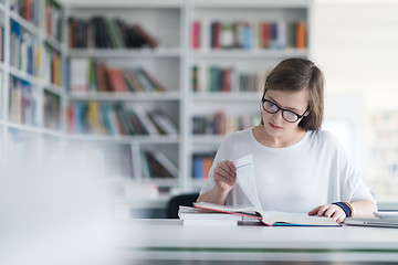 Image showing female student study in school library