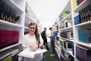 Image showing students group  in school  library