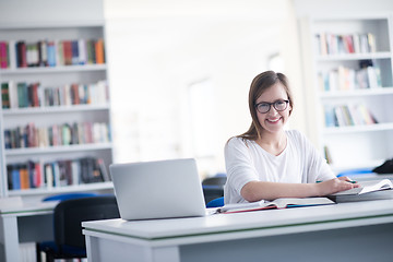 Image showing female student study in school library
