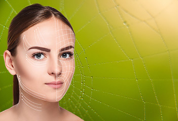 Image showing The woman face  with arrows over green background as web