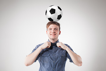 Image showing The guy with ball on gray background