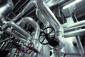Image showing Equipment, cables and piping as found inside of a modern industrial power plant