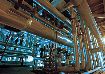 Image showing Equipment, cables and piping as found inside of a modern industr