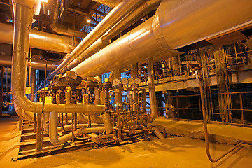 Image showing Equipment, cables and piping as found inside of a modern industr