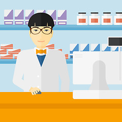 Image showing Pharmacist at counter with cash box.